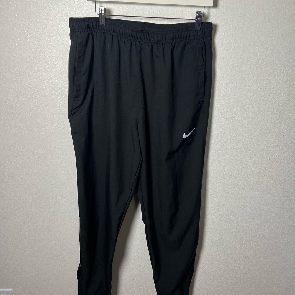 nike dri fit challenger wooven pants